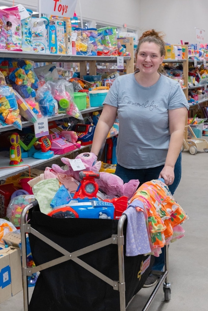 Shopper with cart at JBF sale