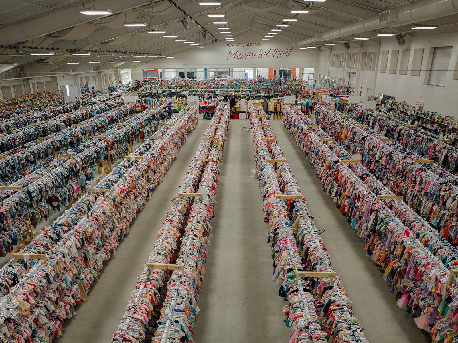 Aerial view of JBF Harrington sale floor at Memorial Hall packed with clothing racks